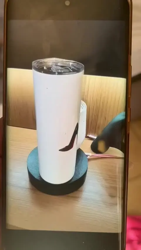 White tumbler with a custom printed design