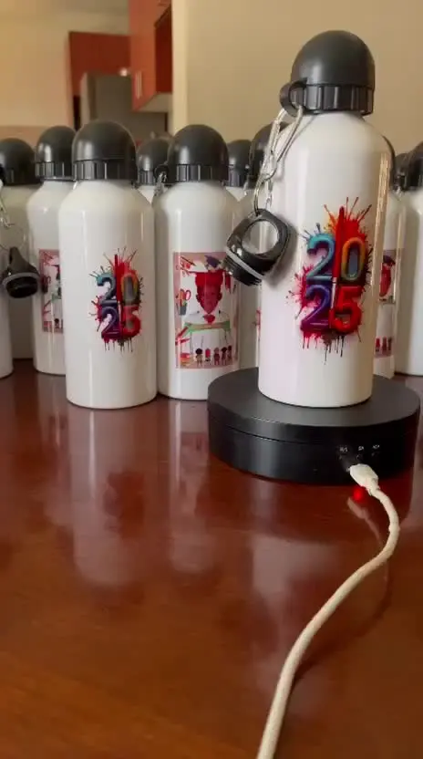 A group of white bottles with matching celebratory artwork