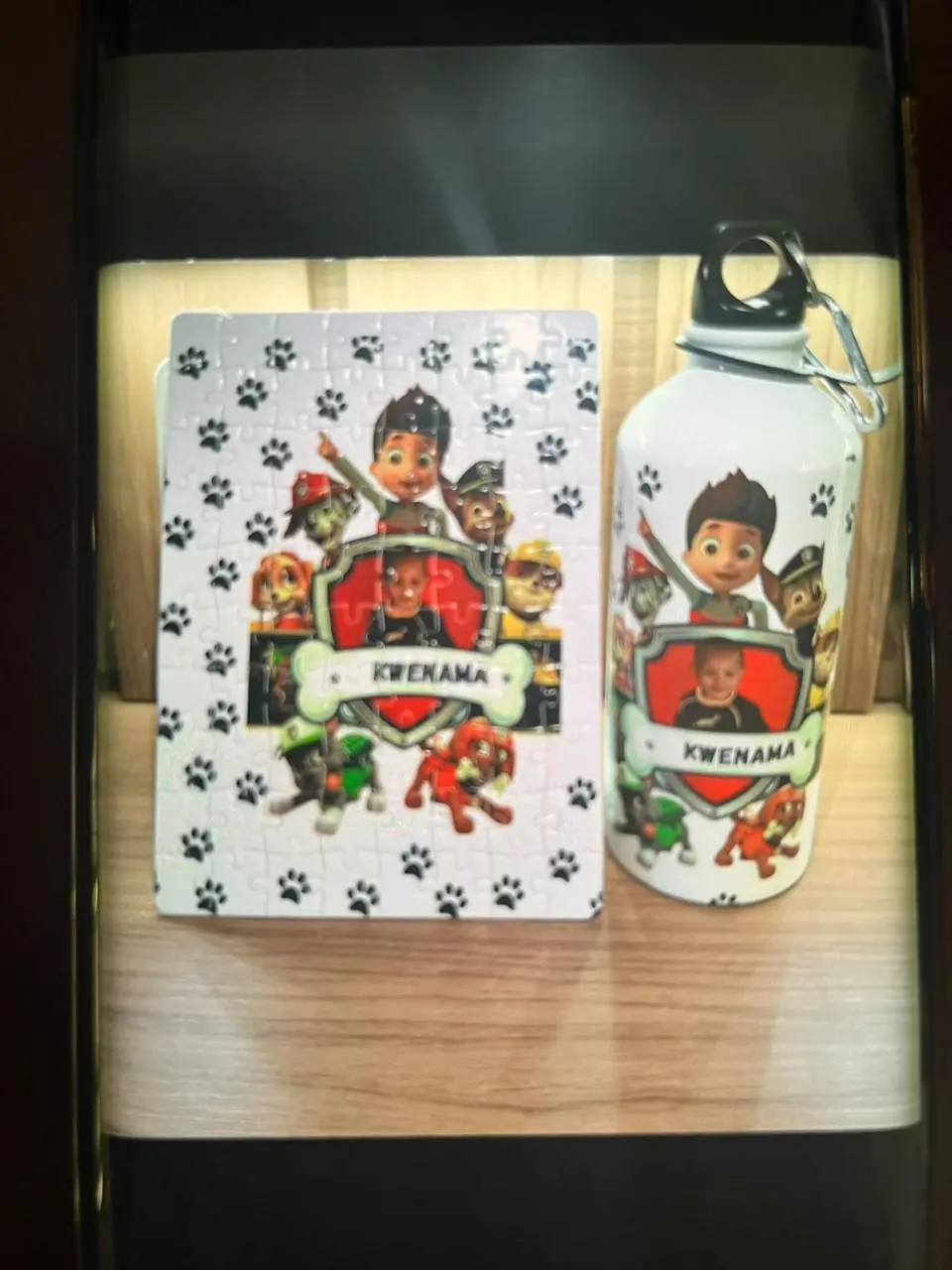 Notebook and bottle with matching colourful personalised artwork